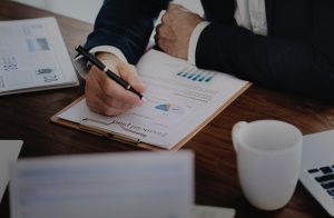 Businessman overlooking financial plan